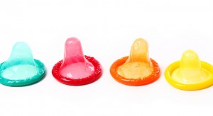 Safe Sex Colorful condoms on a white background