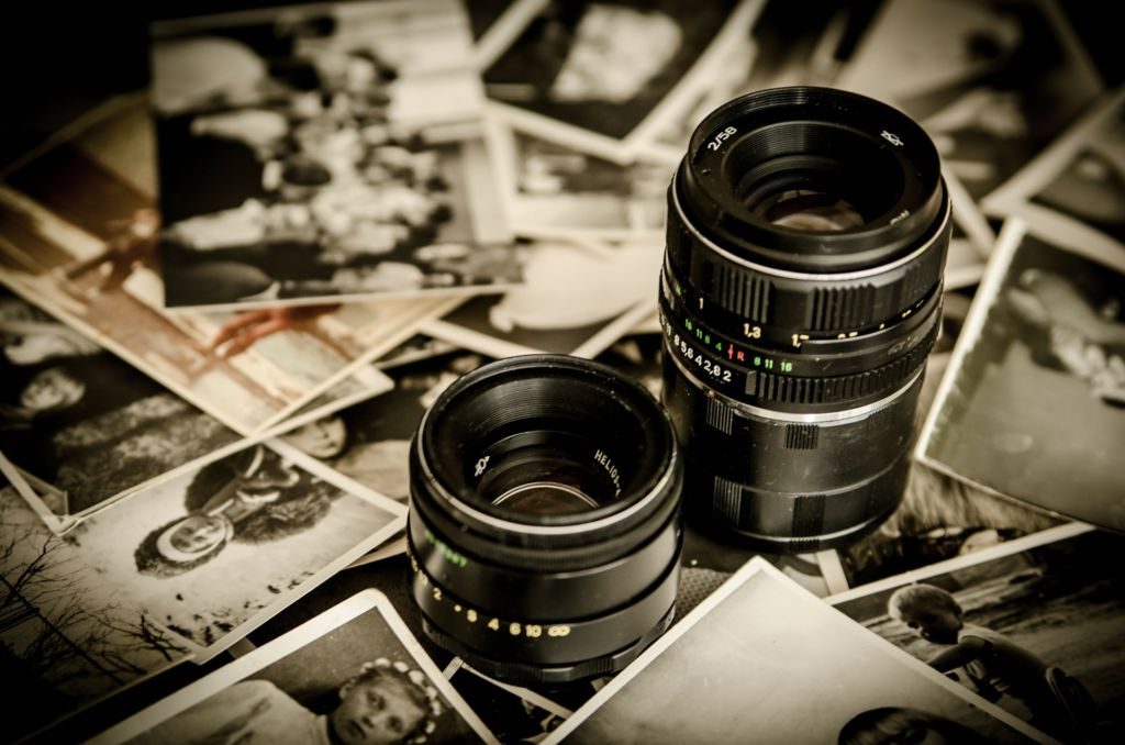 Documented memory with camera lenses and photographs